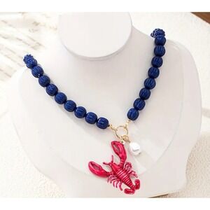 Blue Beaded Necklace with‎ Pink Lobster Charm & Pearl Pendant